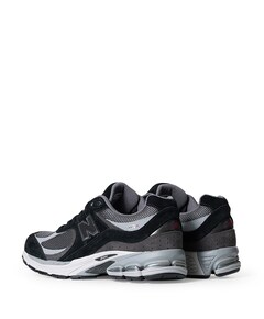 New Balance U2002 RV1 heren sneakers zwart