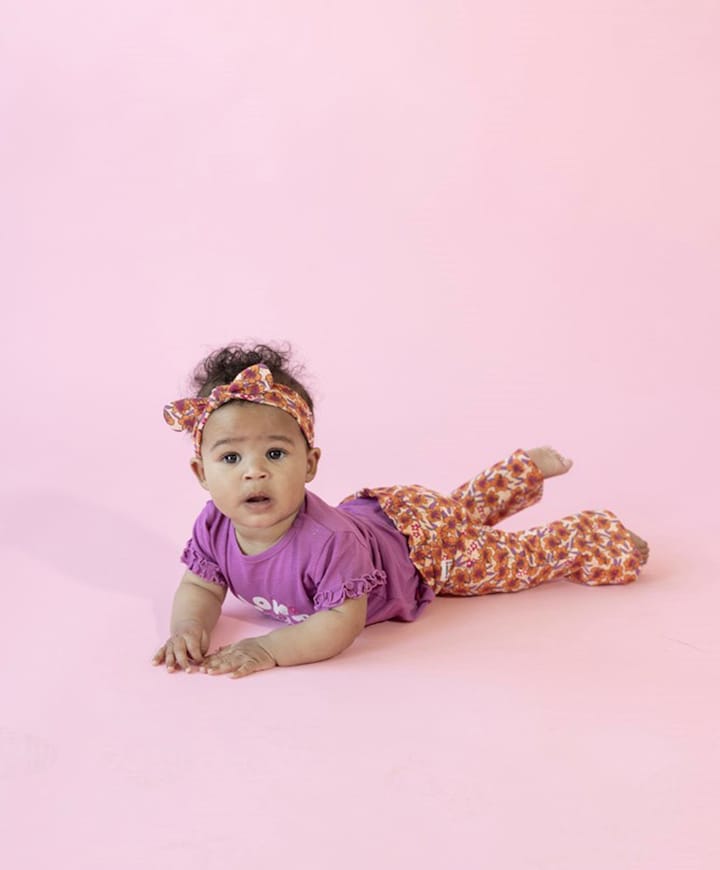 Flare broek AOP meisjes broek oranje