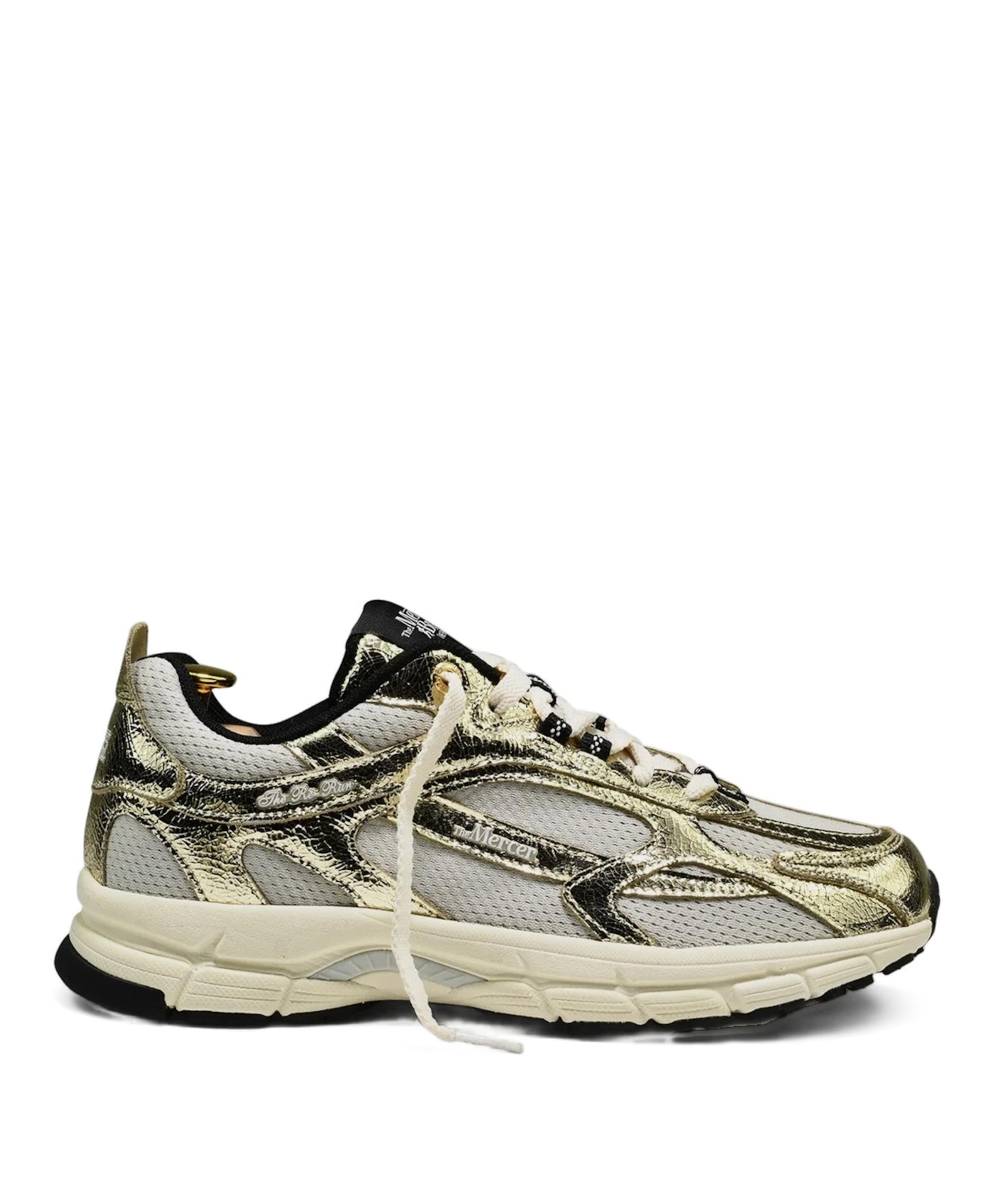 The Re-Run Cracked dames sneakers goud