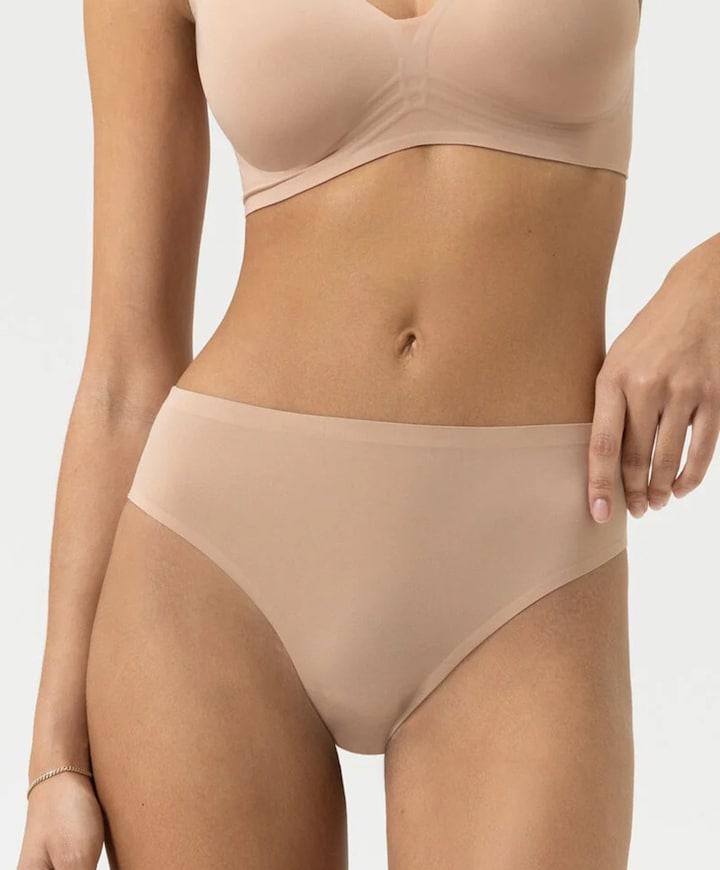 Dames string beige
