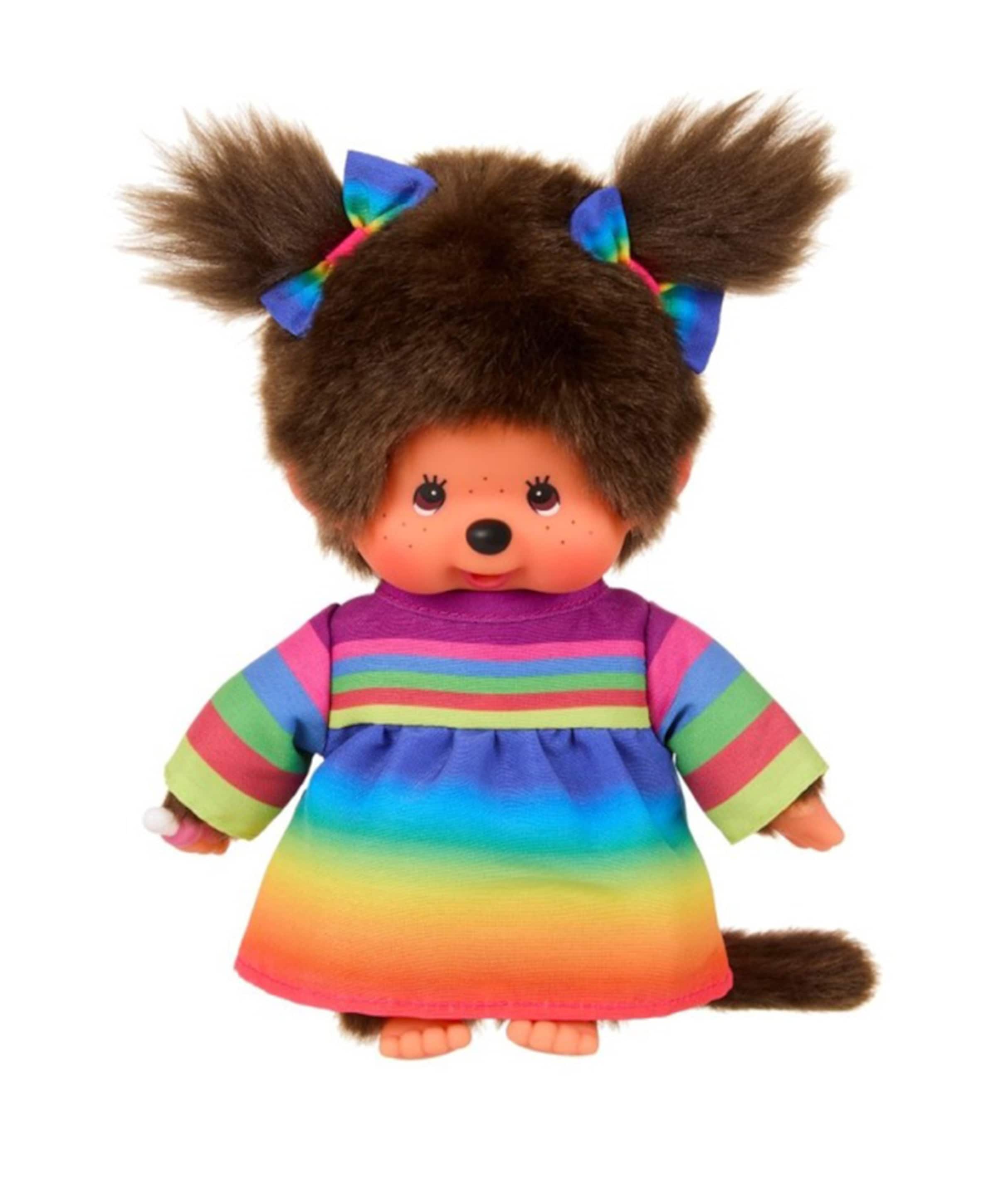 Meisje in regenboogjurk 20 cm