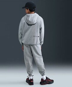 K Nsw Club Flc Jggr Brnd Nrg (consu jongens trainingsbroek grijs