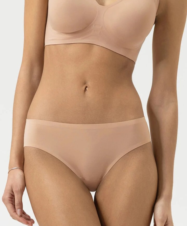 Dames string beige