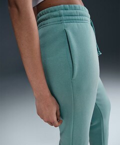 W Nsw Phnx Flc Mr Pant Std broek groen