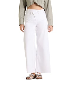 Baggy asymmetrical dames jeans wit